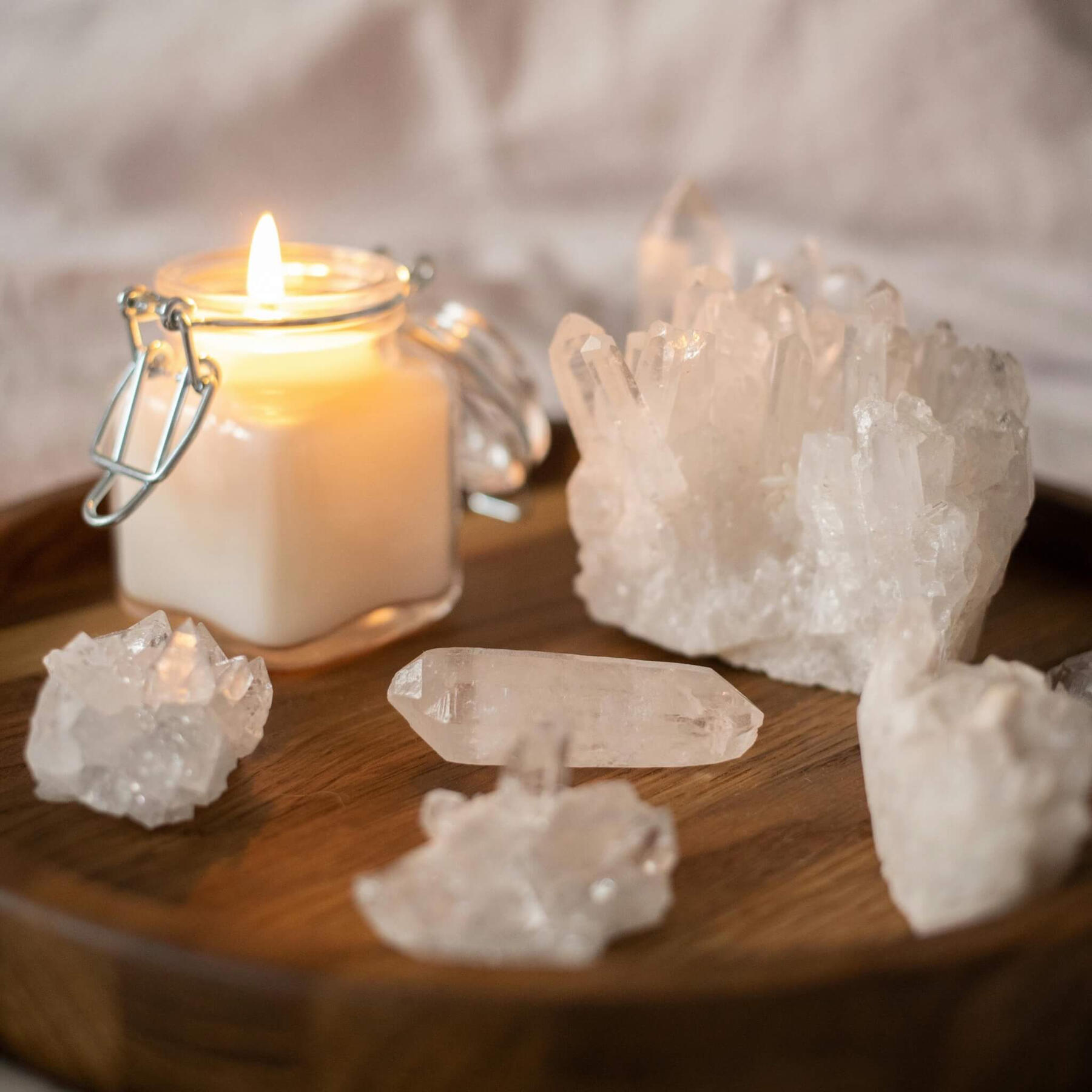 Calm crystals This is a photo of some clear quartz crystals and a white candle.